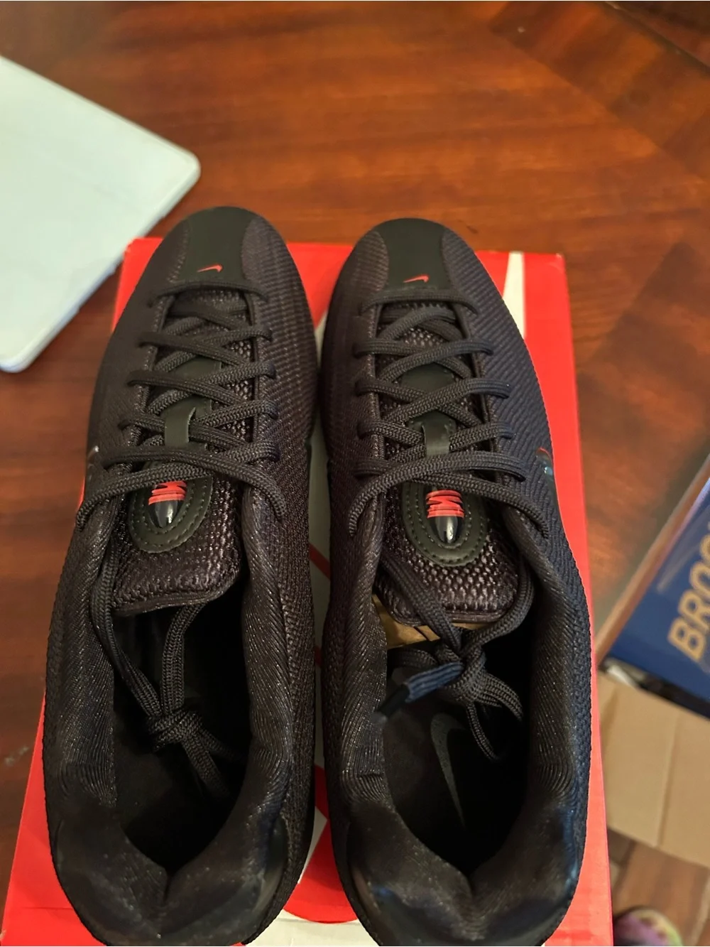 Nike Women’s Black Athletic Shoes with Red Accents